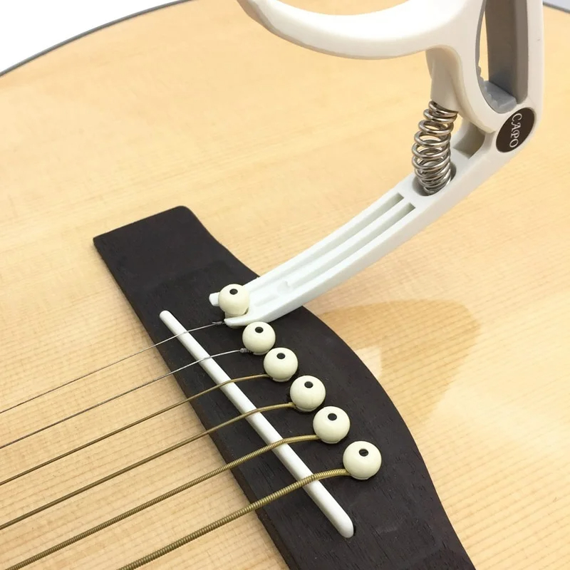 كابو جيتار بلاستيكي مكون من 6  - مراجعة Acoustic Guitar Dreadnought وسعره