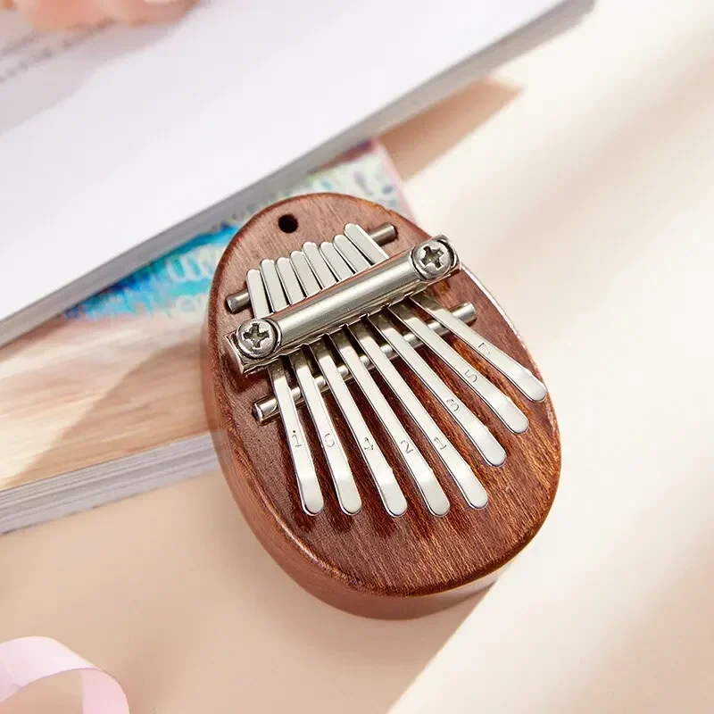 بيانو إصبع خشبي صغير بـ 8 نغما - مراجعة Musical Instrument Kalimba وسعره