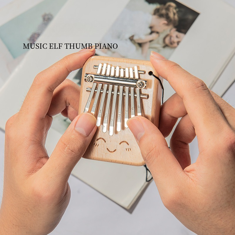 آلة موسيقية بيانو الإبهام الخش - مراجعة Musical Instrument Kalimba وسعره